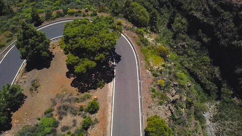 Top view of a car rides along a mountain road on Tenerife, Canary Islands, Spain Video stock 93541601