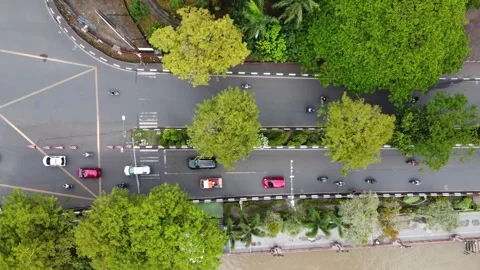 Top view of cars and motorbikes driving through traffic jams during rush ho.. Stock Footage 284126341