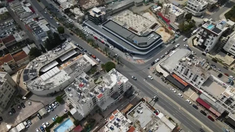 Top view cars drive down the street of a busy city. Stock Footage 272310302