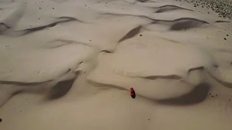 Top view of cars driving through the desert sands in Kazakhstan Stock Footage 115843953