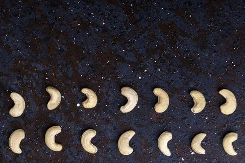 Top view of cashew nuts isolated on black background with copy space Stock Photos