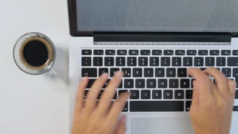 Top view of caucasian hands typing on laptop.  動画素材 117132537