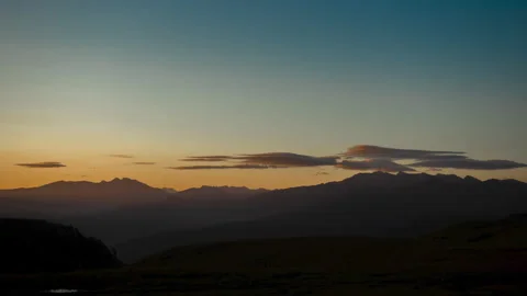 Top view of the Caucasus mountains in the spring season under the twilight sky Stock Footage 132022259