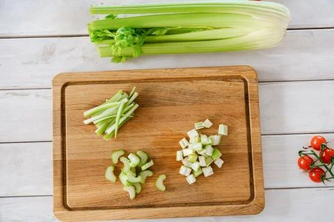 Top View of Celery Cut Three Ways on Board Fotos de archivo