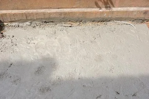Top view cement floor wait for dry at construction site Photos