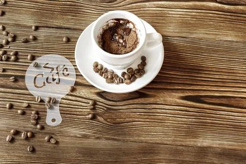 Top view of ceramic cup of hot cappuccino coffee latte with drawing picture o Stock Photos