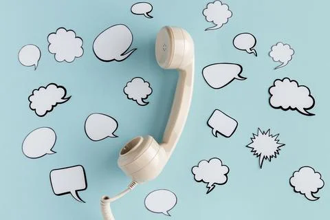 Top view chat bubbles with telephone receiver Stock Photos
