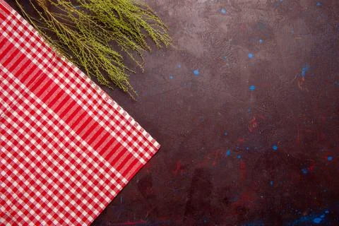 Top view checkered red tissue on dark background color photo background Stock Photos