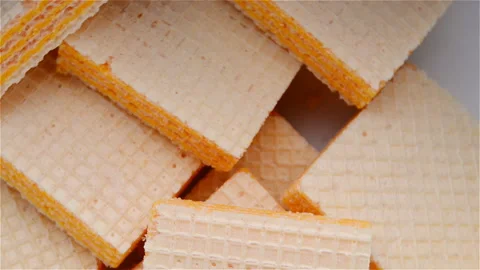 Top view cheese wafer blocks rotating Stock Footage 103304370