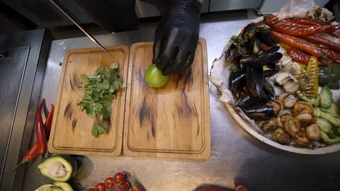 Top view of chef hands cutting the lime at the kitchen Stock Footage 105272068