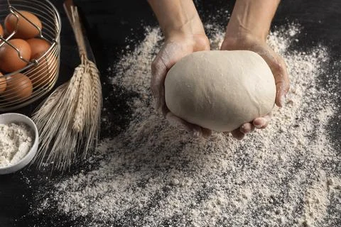 Top view chef holding bread dough 스톡 사진