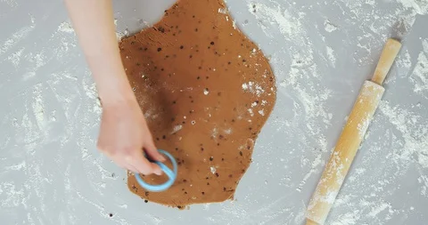 Top view of chef preparing cookies using cookie cutter Stock Footage 129328036