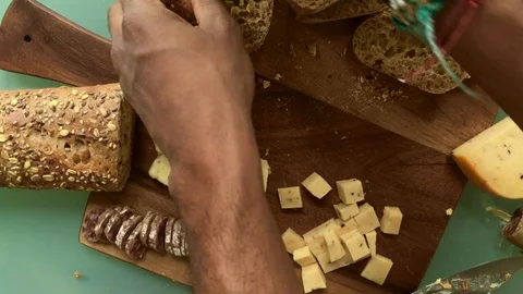 Top view chef preparing wooden board with appetizers - 25 sec Stock Footage 128017013