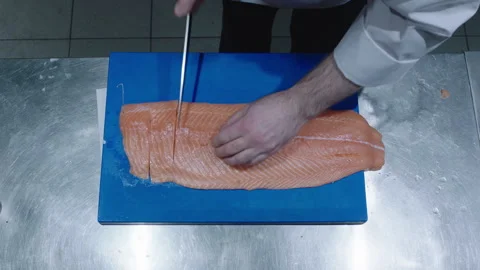 Top view of a chef slicing fish Stock Footage 283009472