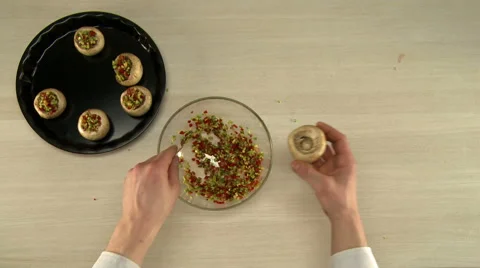 Top view of chef stuffed mushrooms before baking Stock Footage 66404360