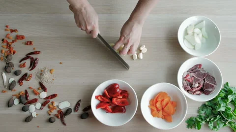 Top View of Chefs Hands Chopping Ginger On Wooden Board, Healthy Food Concept Stock Footage 67213177