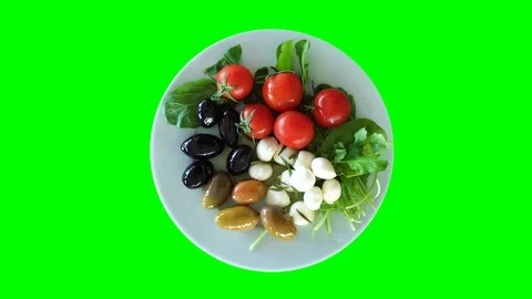 Top view, cherry tomatoes, black and green olives and mozzarella cheese balls Stock Footage 112348750