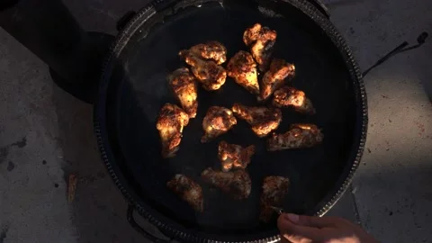 Top view of chicken legs are cooked in a pan and served on a plate with a fork. Stock Footage 166019167