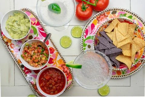 Top view chips, salsa and margaritas Stock Photos