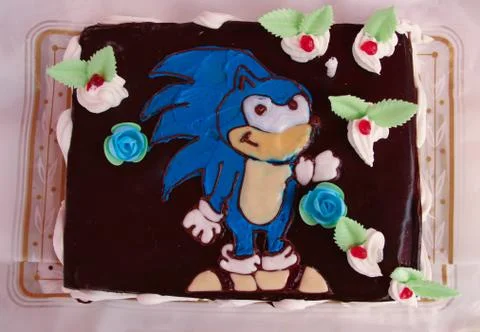 Top view of a chocolate cake with Sonic the Hedgehog hand drawn Stock Photos