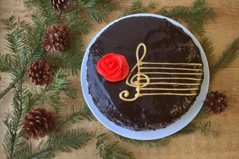 Top View Of A Chocolate Cake With A Stylized Image Of A Musical Staff (Stave) Stock Photos