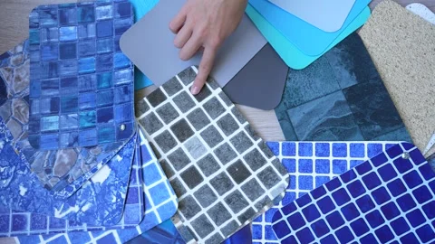 Top view choosing PVC film for swimming pools from many samples Stock Footage 249940468
