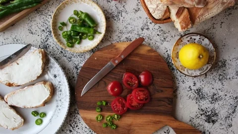 Top view chopped cherry tomatoes and green peppers for making bruschetta wi.. Stock Footage 236608589