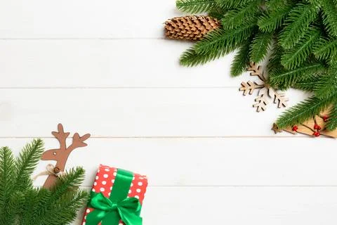 Top view of Christmas background made of fir tree branches and holiday deco.. Stock Photos
