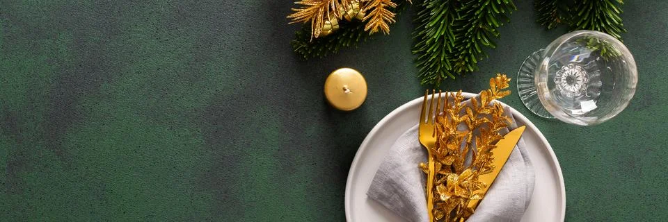 Top view of a Christmas table, featuring an empty plate with a napkin and c.. Stock Photos