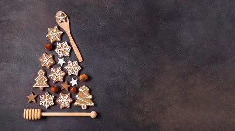 Top view christmas tree shape made gingerbread cookies kitchen utensils with Stock Photos
