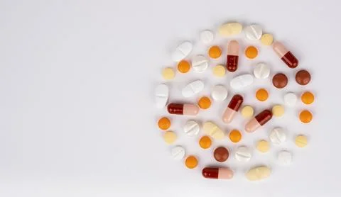 Top view circle shape made of many colorful drugs. Copy space. Stock Photos