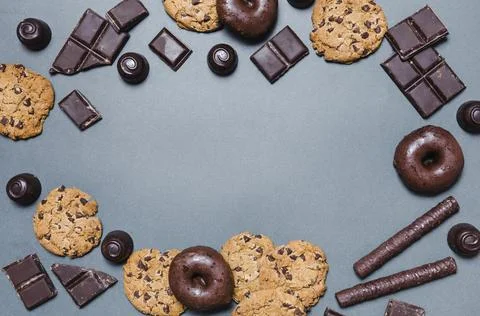 Top view circular frame with chocolate candies Stock Photos