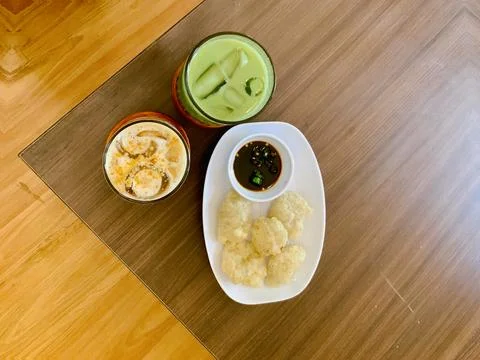 Top view of Cireng fried snacks with iced drinks Stock Photos