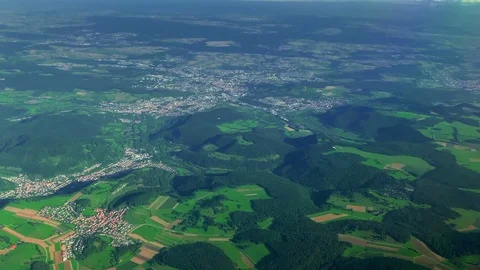 Top view of the city and fields of Germany from the window of an airplane Stock Footage 114885377