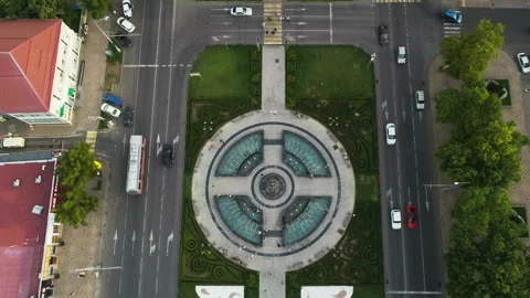 Top view of the city square next to the road where transport goes city life Stock Footage 128131050