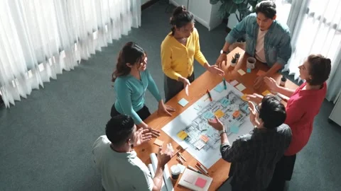 Top view of civil engineer team shaking hand while discussing idea. Symposium. Stock Footage 270991685