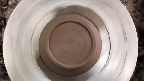 Top view of clay bowl spin on pottery wheel. Stock Footage 337211249
