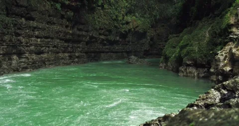 Top View of Clear River Pool Surrounded by Tropical Canyon Forest 스톡 동영상 332606576