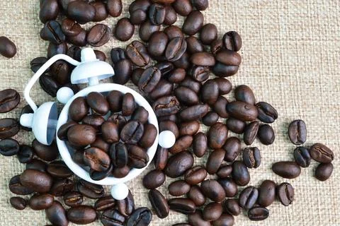 Top view of clock and coffee bean brown roasted Stock Photos