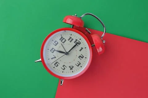 Top view of clock and school stationery tools with copy space. Stock Photos