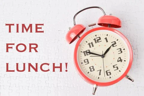 Top view of clock isolated on white background written with TIME FOR LUNCH! Stock Photos