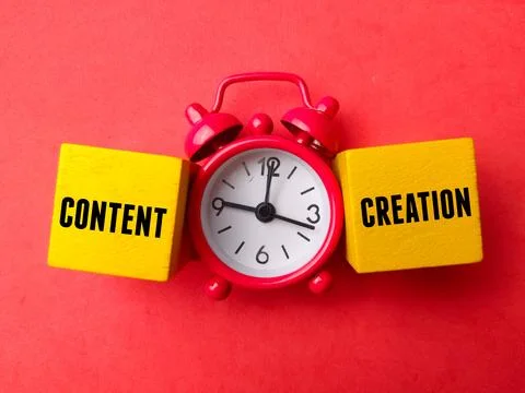 Top view clock with text CONTENT CREATION Stock Photos