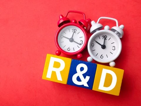 Top view clock with text R AND D Stock Photos