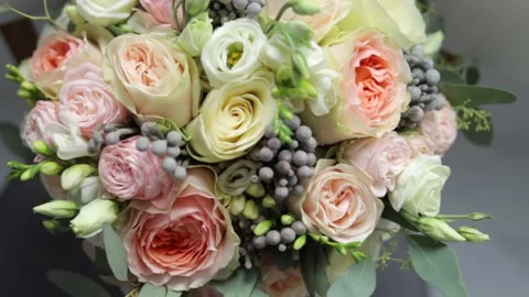 Top view close up of beautiful modern wedding bouquet of roses for bride. Stock Footage 246534837