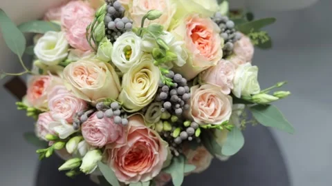 Top view close up of beautiful modern wedding bouquet of roses for bride. Stock Footage 246534890