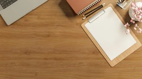 Top view close up of blank paper on clipboard with pencil and notebook asid.. Stock Illustration