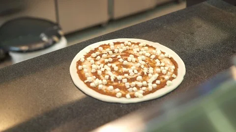 Top view close up of chef takes raw cheese pizza to bake 스톡 동영상 121850656