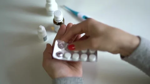 Top view close up female hands and pills Stock-Footage 235471313
