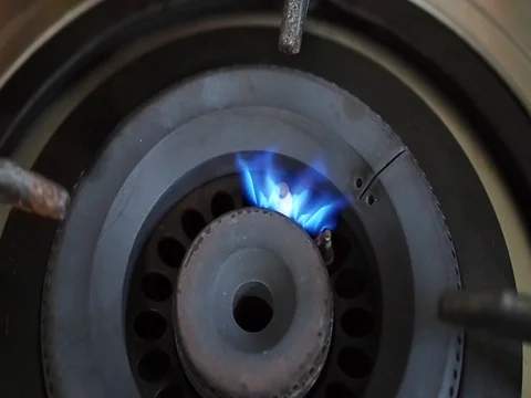 Top view close up gas stove lid, ignite flame Stock Footage 80801232