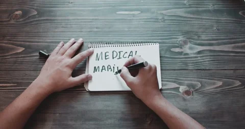 Top view, close-up hands of a man writing Stock Footage 260938375